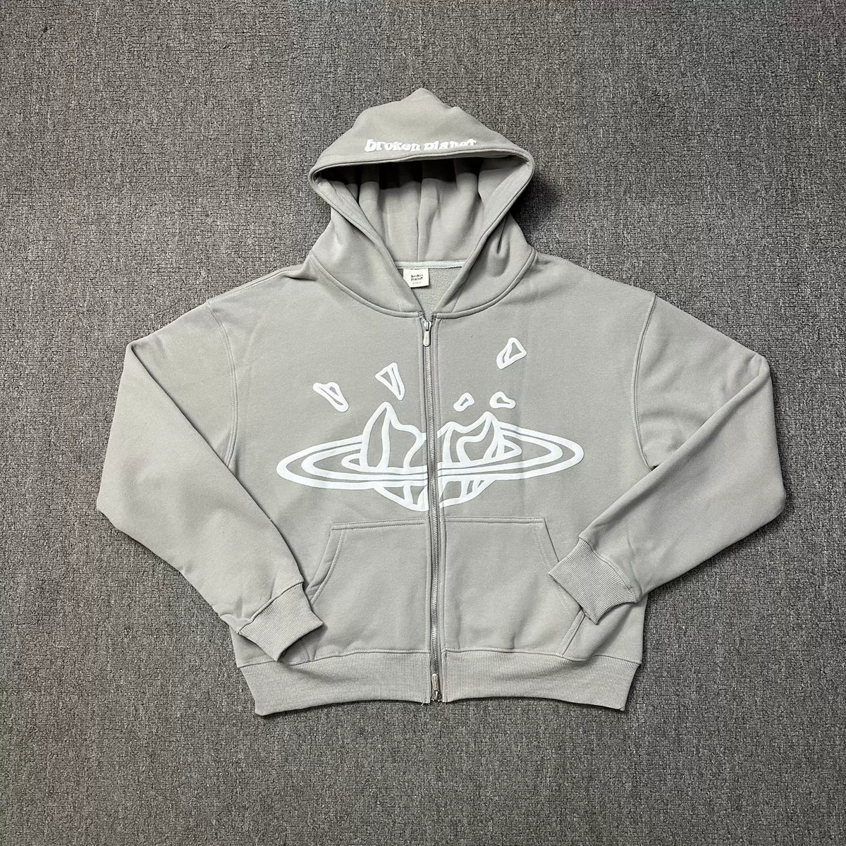 Broken Planet Zip-Up Hoodie in Grey with White Graphic
