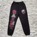 Saint Vanity Varsity Applique Sweatpants - Black/Red
